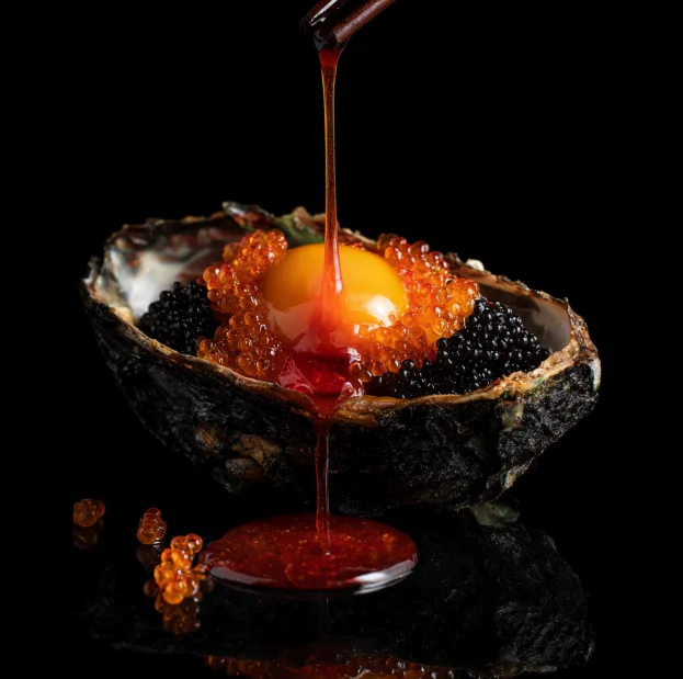 Oyster with caviar and ikura